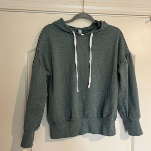 Green long sleeve with hood, kinda cropped